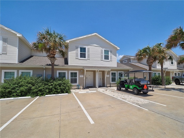 view of front of house featuring a carport