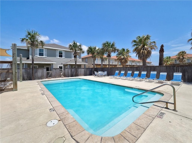 15017 Beach Walk Loop, Corpus Christi, TX 78418 - community pool with a patio area and fence