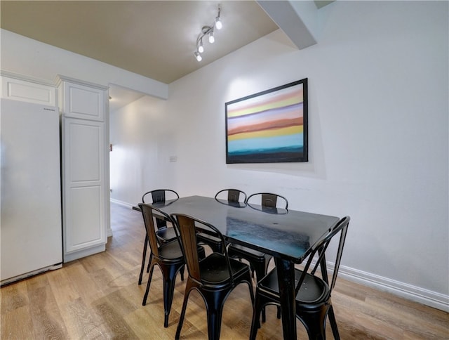 dining area featuring light hardwood / wood-style flooring