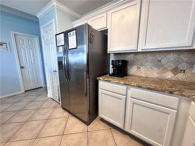 15006 Aruba Dr Unit A, Corpus Christi, TX 78418 - kitchen featuring fridge with ice dispenser, light tile patterned flooring, ornamental molding, decorative backsplash, and white cabinetry