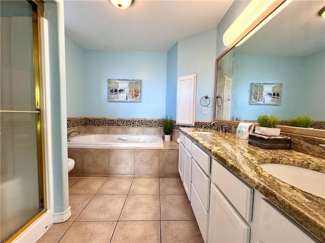 15006 Aruba Dr Unit A, Corpus Christi, TX 78418 - bathroom with tile patterned flooring, double vanity, a bath, and a stall shower