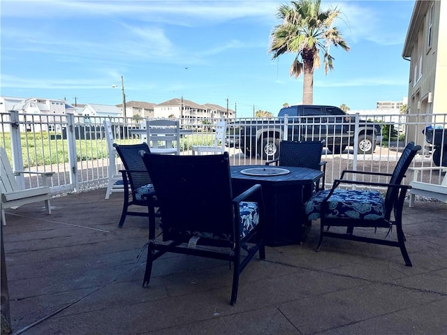 15006 Aruba Dr Unit A, Corpus Christi, TX 78418 - view of patio / terrace featuring a residential view and an outdoor fire pit