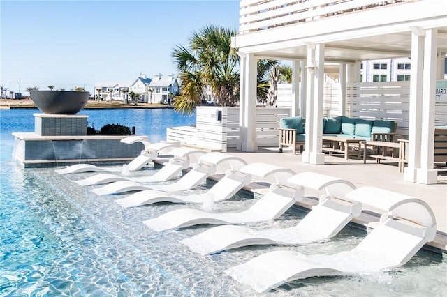 view of patio featuring a water view and an outdoor hangout area