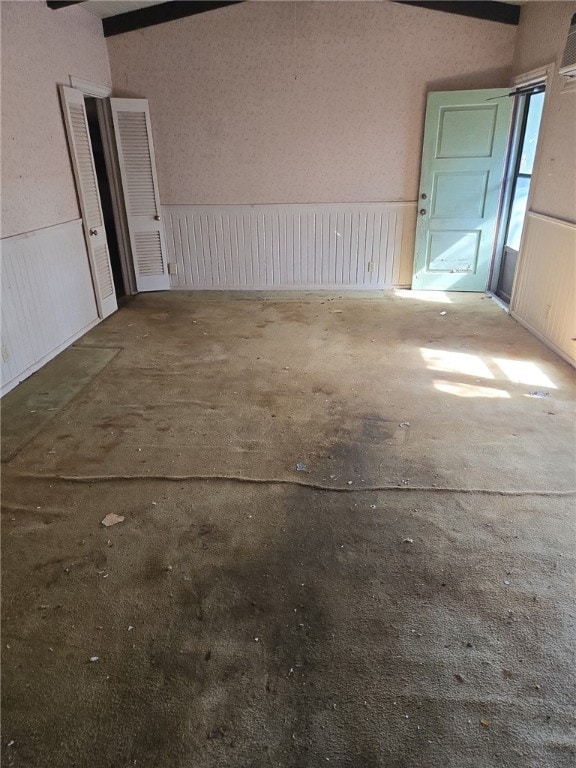 306 S Hall St, Beeville, TX 78102 - garage featuring a wainscoted wall