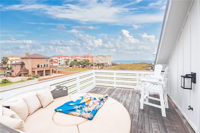 balcony with outdoor lounge area and a residential view