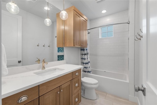 bathroom with toilet, shower / tub combo with curtain, and vanity