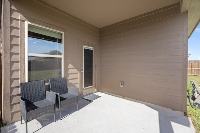 view of patio with fence