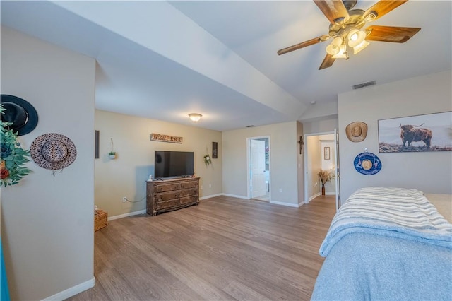 2122 Halcon St, Corpus Christi, TX 78414 - bedroom with wood finished floors, baseboards, a ceiling fan, and visible vents
