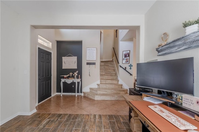2122 Halcon St, Corpus Christi, TX 78414 - foyer with baseboards, wood finish floors, and stairs