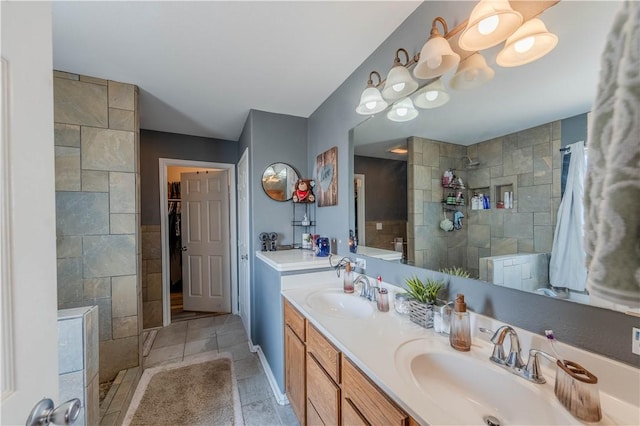2122 Halcon St, Corpus Christi, TX 78414 - bathroom with a walk in shower, tile patterned floors, double vanity, and a sink