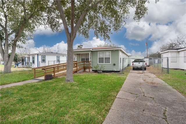 bungalow-style house featuring a front yard