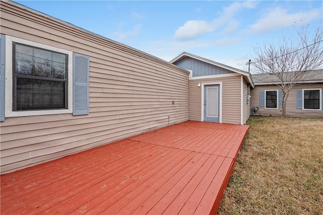 wooden deck with a yard