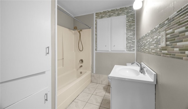 bathroom with  shower combination, vanity, tile patterned floors, and decorative backsplash