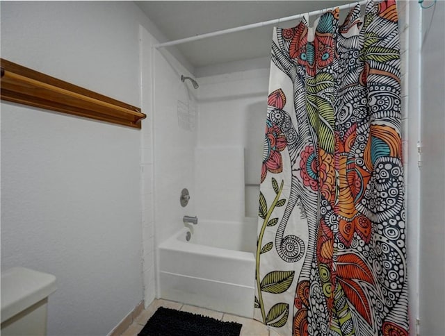 5973 State Highway 361 Unit 433, Port Aransas, TX 78373 - bathroom featuring shower / tub combo with curtain, tile patterned floors, baseboards, and toilet