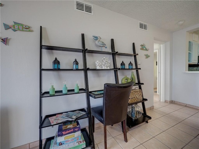 5973 State Highway 361 Unit 433, Port Aransas, TX 78373 - tiled office featuring a textured ceiling and baseboards