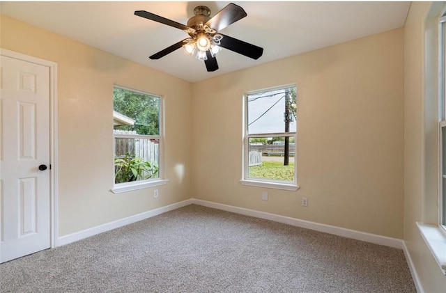 329 Yorktown Blvd, Corpus Christi, TX 78418 - unfurnished room featuring carpet, baseboards, and a ceiling fan