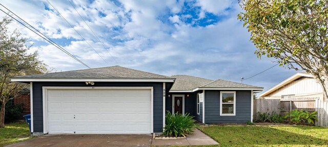 329 Yorktown Blvd, Corpus Christi, TX 78418 - ranch-style house with concrete driveway, an attached garage, and a shingled roof