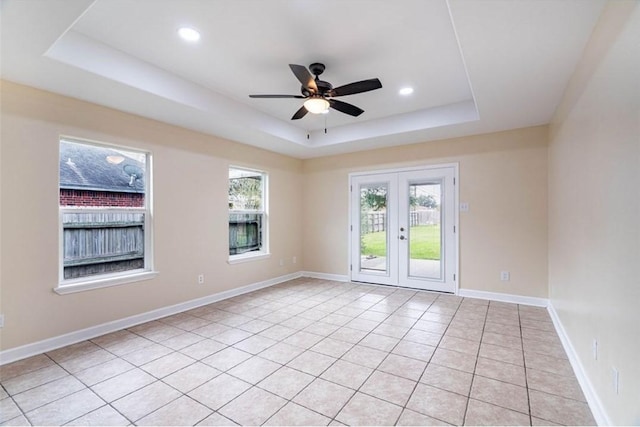 329 Yorktown Blvd, Corpus Christi, TX 78418 - spare room featuring a raised ceiling, french doors, a ceiling fan, light tile patterned floors, and recessed lighting
