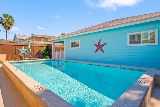 623 Sandkey Dr, Port Aransas, TX 78373 - community pool featuring fence