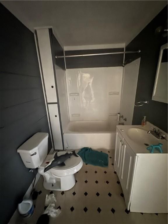 bathroom with shower / washtub combination, vanity, and toilet