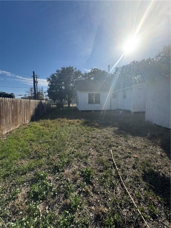 view of yard featuring fence