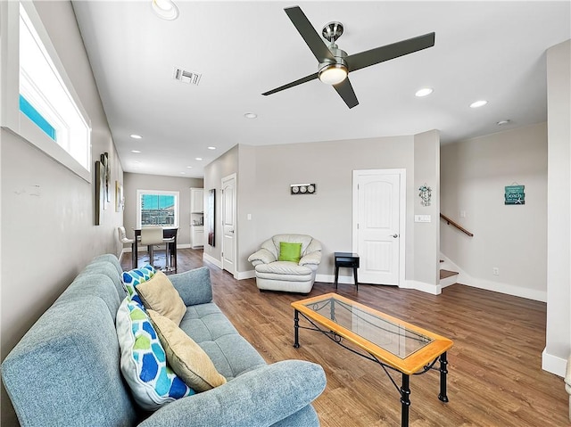 14309 Ridley Way, Corpus Christi, TX 78418 - living area featuring recessed lighting, baseboards, stairway, ceiling fan, and wood finished floors