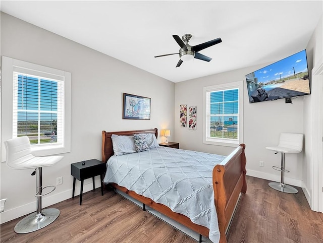 14309 Ridley Way, Corpus Christi, TX 78418 - bedroom featuring wood finished floors, baseboards, and ceiling fan