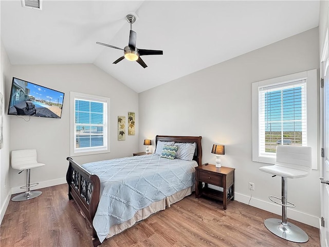 14309 Ridley Way, Corpus Christi, TX 78418 - bedroom with wood finished floors, baseboards, vaulted ceiling, and a ceiling fan