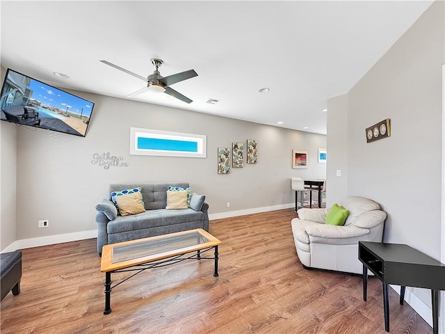 14309 Ridley Way, Corpus Christi, TX 78418 - living room featuring wood finished floors, a ceiling fan, baseboards, and recessed lighting