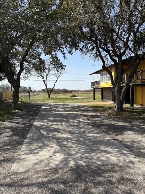 view of street featuring driveway