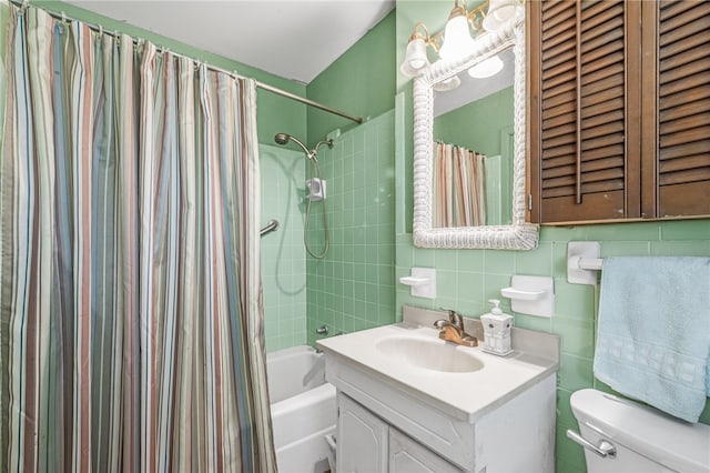 full bathroom with toilet, tile walls, decorative backsplash, vanity, and shower / tub combo with curtain