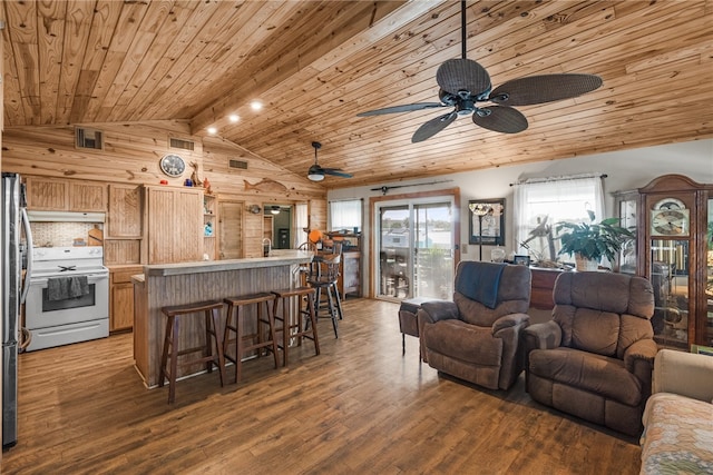 living room featuring wood walls, wood ceiling, light wood-type flooring, and vaulted ceiling with beams