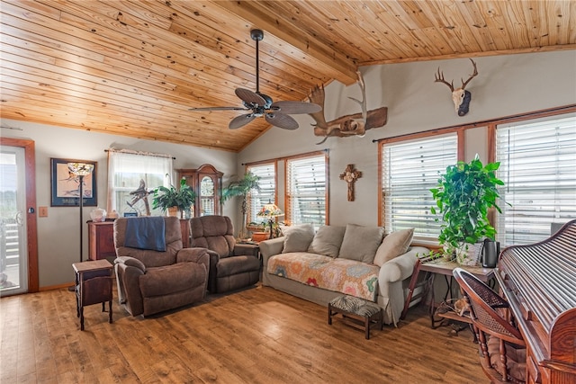 living room featuring hardwood / wood-style flooring, ceiling fan, wood ceiling, and vaulted ceiling with beams