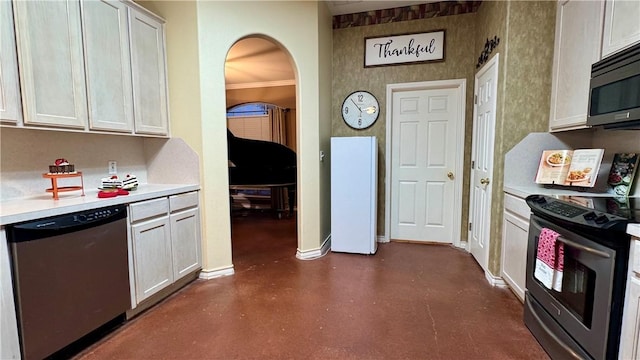 5906 Lindenwood Dr, Corpus Christi, TX 78414 - kitchen with white cabinets, appliances with stainless steel finishes, and ornamental molding