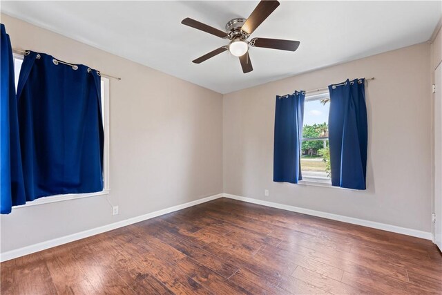 4002 Brawner Pkwy, Corpus Christi, TX 78411 - spare room with hardwood / wood-style floors, baseboards, and a ceiling fan