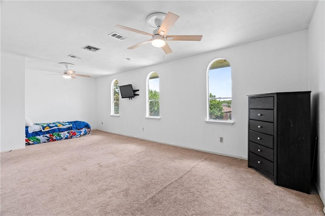 5110 Cascade Dr, Corpus Christi, TX 78413 - unfurnished bedroom with carpet floors and a ceiling fan