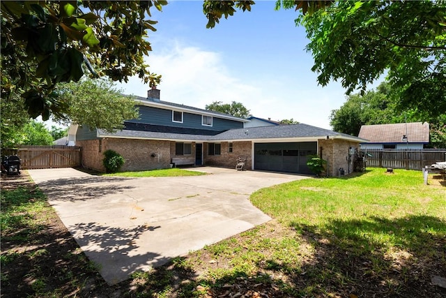5110 Cascade Dr, Corpus Christi, TX 78413 - view of front of property with brick siding, concrete driveway, a chimney, and a garage
