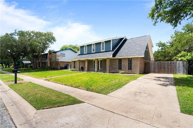 5110 Cascade Dr, Corpus Christi, TX 78413 - traditional-style house featuring concrete driveway, brick siding, and roof with shingles