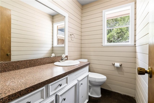 5110 Cascade Dr, Corpus Christi, TX 78413 - half bath featuring vanity and wood walls