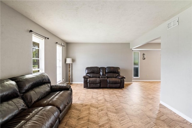 5110 Cascade Dr, Corpus Christi, TX 78413 - living room featuring a textured ceiling