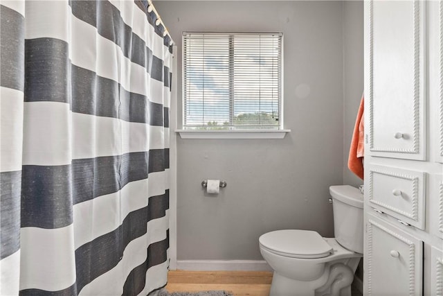 5110 Cascade Dr, Corpus Christi, TX 78413 - bathroom with wood finished floors and curtained shower