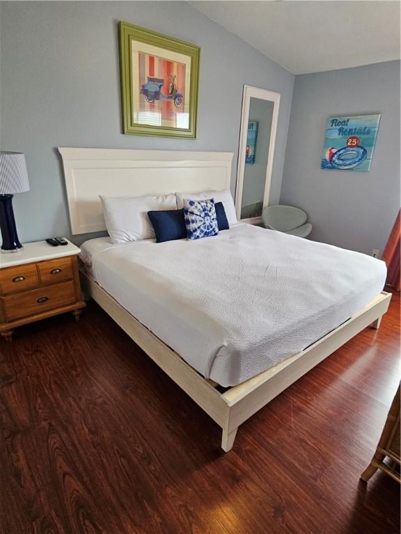 15425 Fortuna Bay Dr Unit 314, Corpus Christi, TX 78418 - bedroom featuring dark wood-type flooring