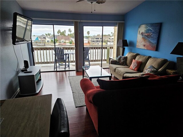 15425 Fortuna Bay Dr Unit 314, Corpus Christi, TX 78418 - living room featuring healthy amount of natural light, ceiling fan, wood finished floors, and a textured wall