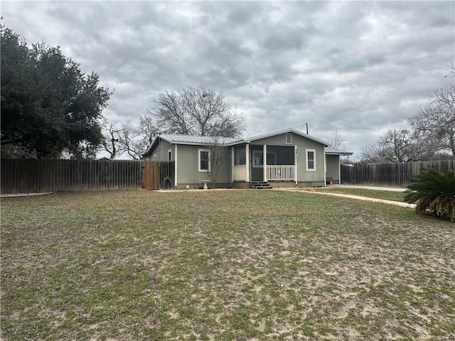 view of front of home with a front lawn