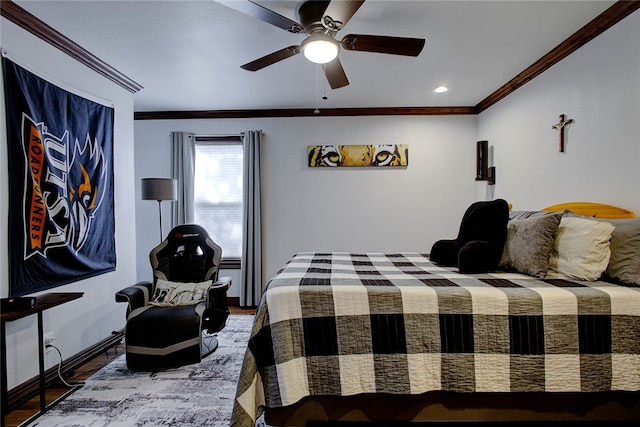 bedroom with hardwood / wood-style flooring, crown molding, and ceiling fan