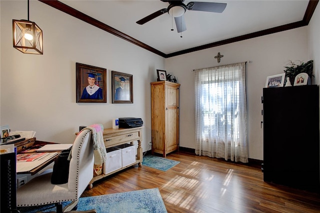 home office featuring crown molding, wood-type flooring, and ceiling fan