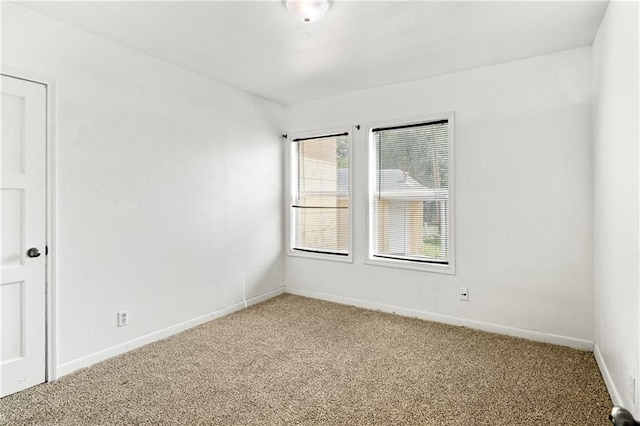 view of carpeted spare room