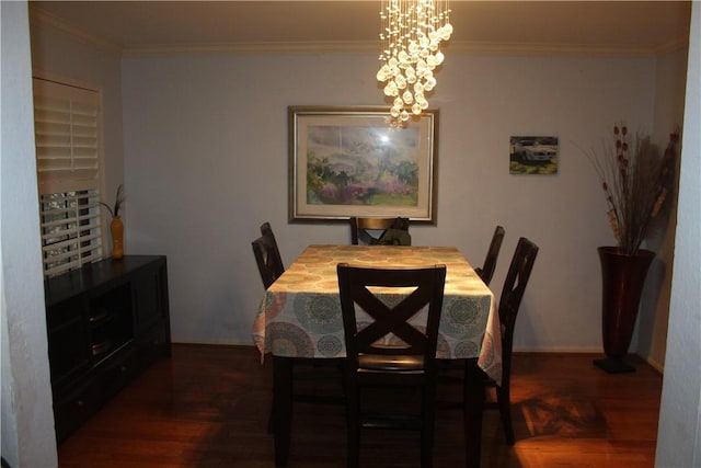 6605 Whitewing Dr, Corpus Christi, TX 78413 - dining area with dark wood-style flooring, a chandelier, and ornamental molding