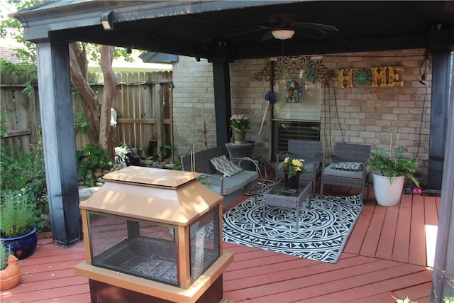 6605 Whitewing Dr, Corpus Christi, TX 78413 - wooden terrace featuring a ceiling fan and outdoor lounge area