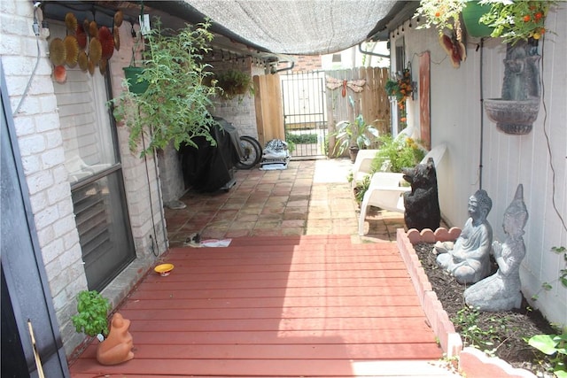6605 Whitewing Dr, Corpus Christi, TX 78413 - wooden terrace featuring a patio